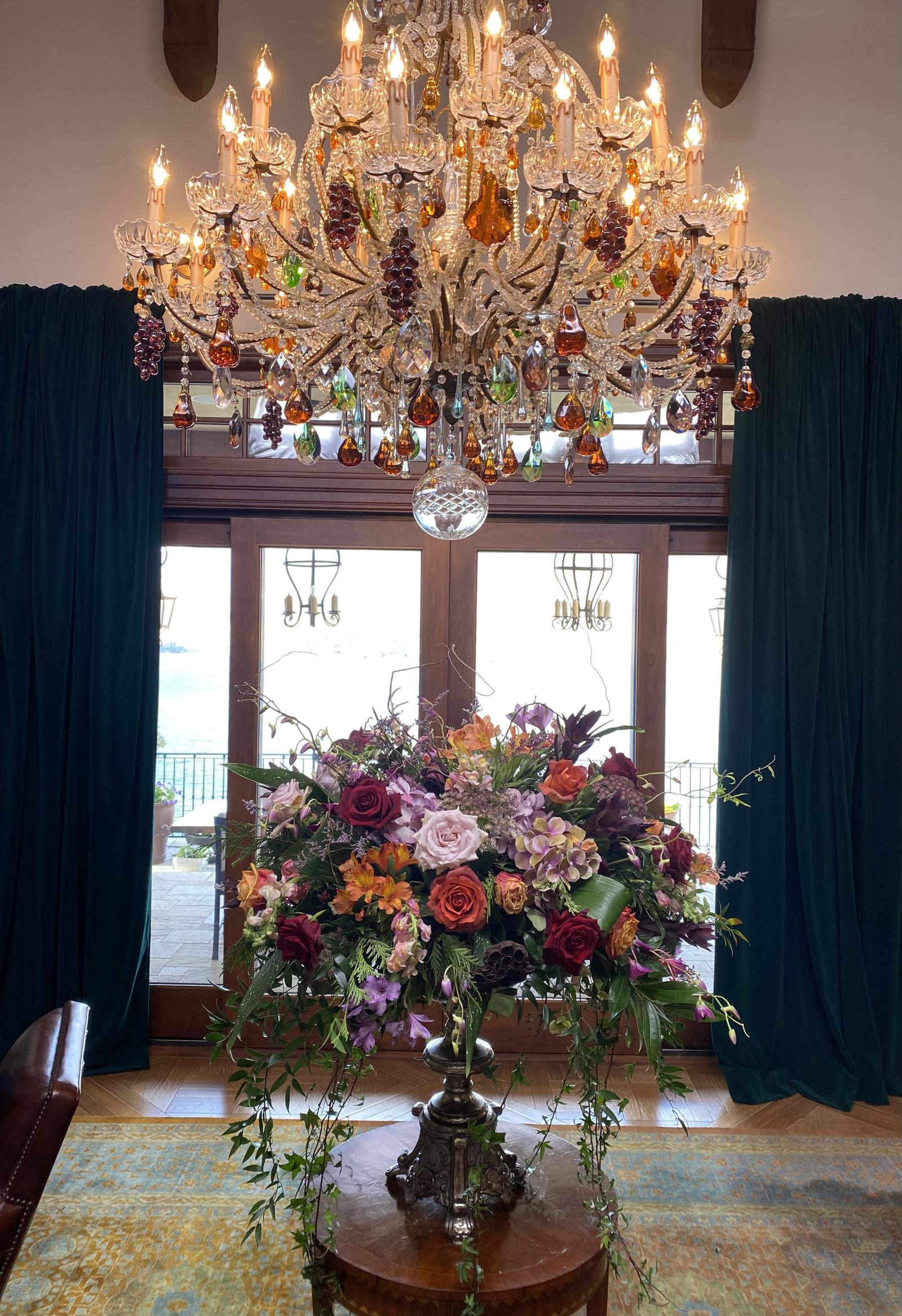Showstopper arrangement in the Chandelier Room, underneath the Italian glass-blown chandelier