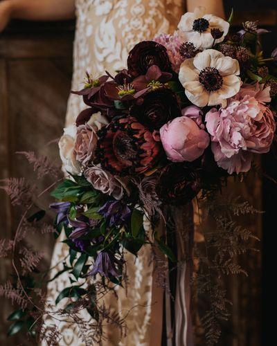 Elegant Luxury Wedding Classy Dark Moody Purple Eggplant Roses Hydrangea Orchids Ranunculus Peony Anemone Garland Bouquet Arrangement Table Garland Wedding Cake Model Floral Installation Hanging Flowers Candlelight Table Four Points Hotel Joel’s View Photography WedLuxe Magazine Bridal Photoshoot
Outdoors Kelowna Okanagan Wedding Ceremony Reception Bride Groom Bridesmaid Groomsman Florist Flowers Floral