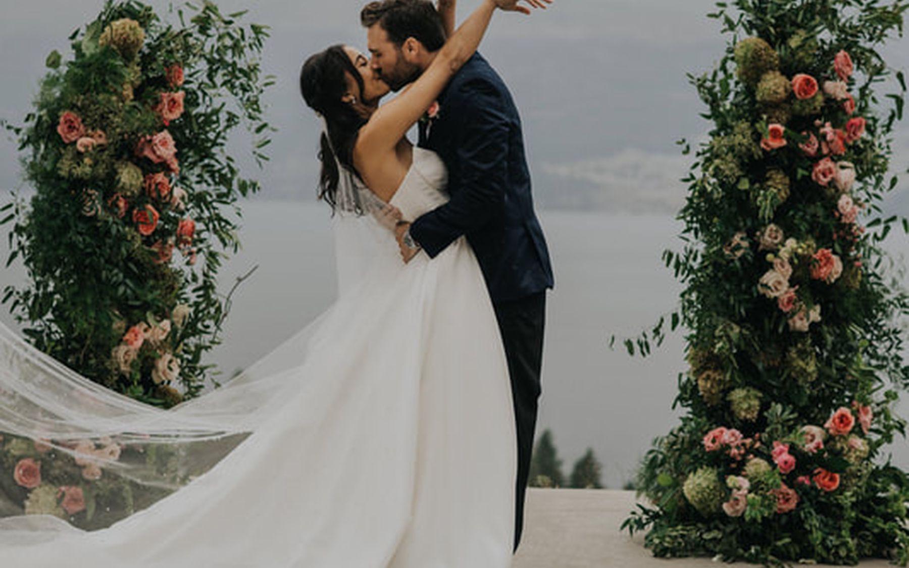 Bride and groom with florals