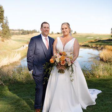 Karen and partner with fall wedding florals